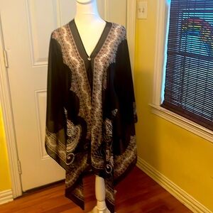 Jjill poncho can be worn 2 ways.